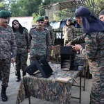 Lt Gen Pushkar Reviewing Equipment