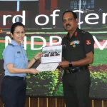 Officer Awarding Female Officer