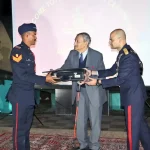 Officer Giving Award to Cadet
