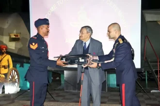 Officer Giving Award to Cadet