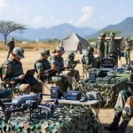 Soldiers Using Mobile and Laptops