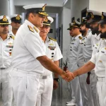 Vice Admiral Sanjay Bhalla Shaking Hands