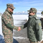 Lt Gen Mishra Shaking Hands