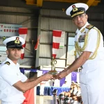 Officer Getting Trophy