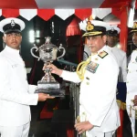 Vice Admiral Sameer Saxena Giving Award to Agniveer 1