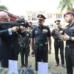 Nikolaos Dendias Using Gun