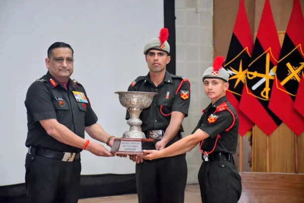 Officer Presenting Trophy