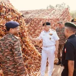 Surg VAdm Vivek Hande Reviewing