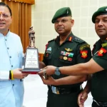 CM Of Uttrakhand Giving Trophy