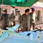 Maj Gen MPS Gill Reviewing