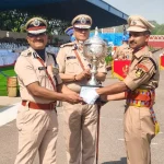 Officer Giving Trophy