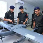 Officers Reviewing Drone