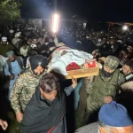 Peope Carrying Tahir Fazal