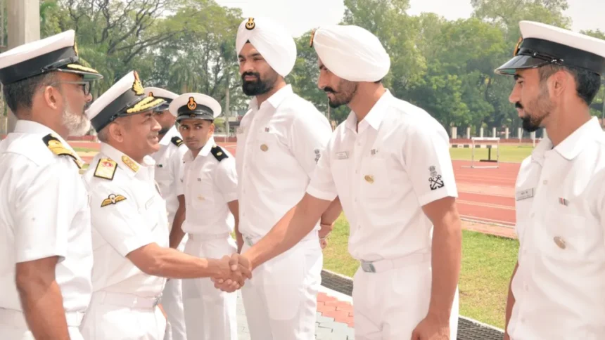 Vice Adm C R Praveen Nair Shaking Hands