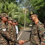 Maj Gen Manish Kumar Shaking Hands