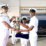 Officer Giving Trophy
