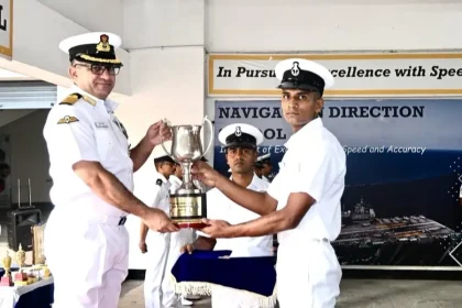 Officer Giving Trophy