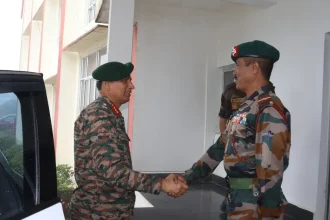 Lt Gen Kalia Shaking Hands