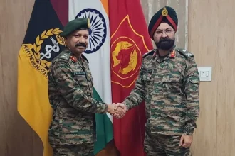 Maj Gen VK Patra Shaking Hands