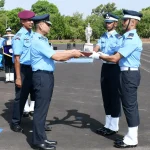 Officer Giving Trophy