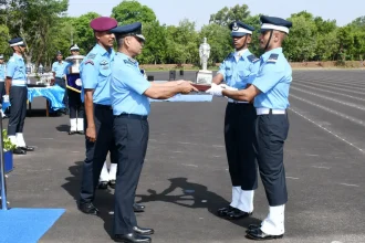 Officer Giving Trophy