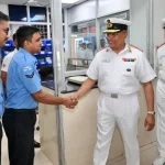 Surg VAdm Shankar Shaking Hands