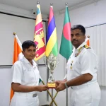 Trophy Being Given by Officers