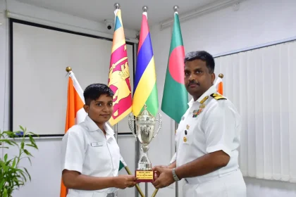 Trophy Being Given by Officers