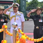 Vice Admiral Vineet McCarty Saluting