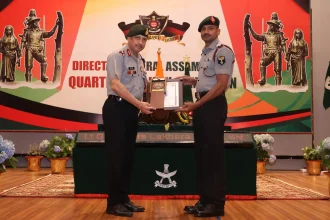 DG Assam Rifles Giving Award to Officer