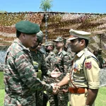General Dhiraj Seth Shaking Hands