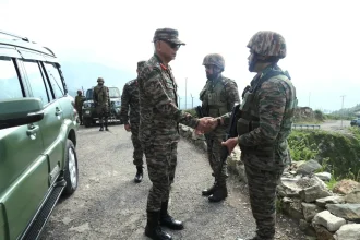 Lt Gen PK Mishra Shaking Hands