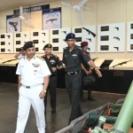Rear Admiral Chandegave Reviewing