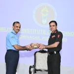 Air Vice Marshal Manu Midha Giving Memento