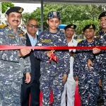 Officer Cutting Ribbon