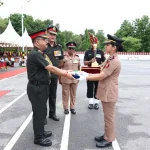 Officer Giving Trophy