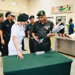 Surg VAdm Arti Sarin Reviewing 1