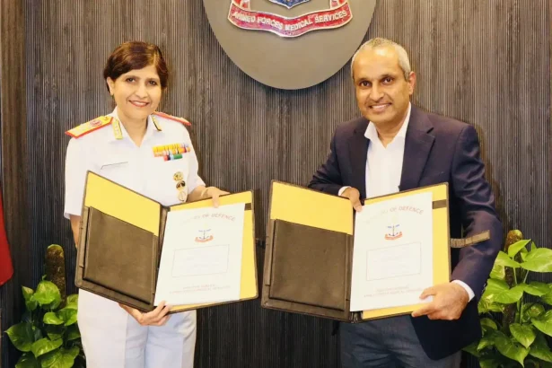 Surg VAdm Arti Sarin with Official of TMC