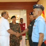 Vice Adm Vineet McCarty Shaking Hands