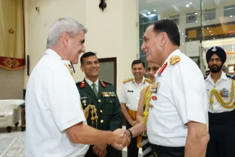 General Dhiraj Seth Shaking Hands