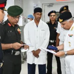 Surg VAdm KM Adhikari Reviewing